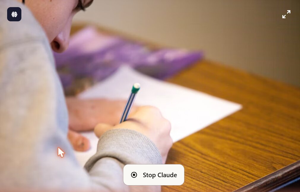 Student writing with a pencil during a maths exam